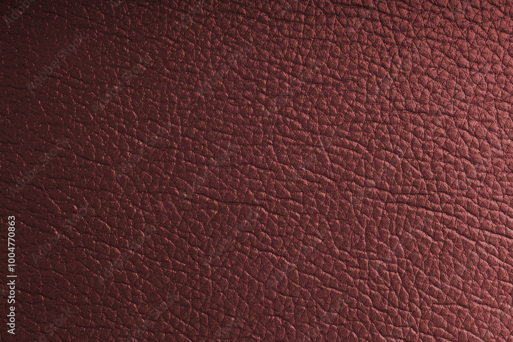 Natural, genuine red leather with metallic effect, texture of glossy leatherette background Natural, genuine red leather with metallic effect, texture of glossy leatherette background