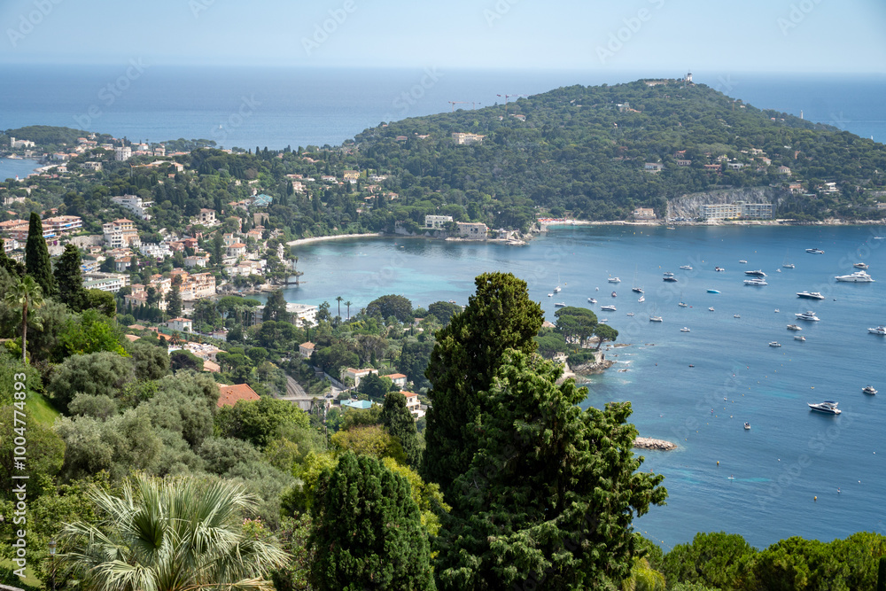Panoramic view of Saint-Jean-Cap-Ferrat commune in Alpes-Maritimes in Provence-Alpes-Cote d'Azur, French Riviera, France Panoramic view of Saint-Jean-Cap-Ferrat commune in Alpes-Maritimes in Provence-Alpes-Cote d'Azur, French Riviera, France
