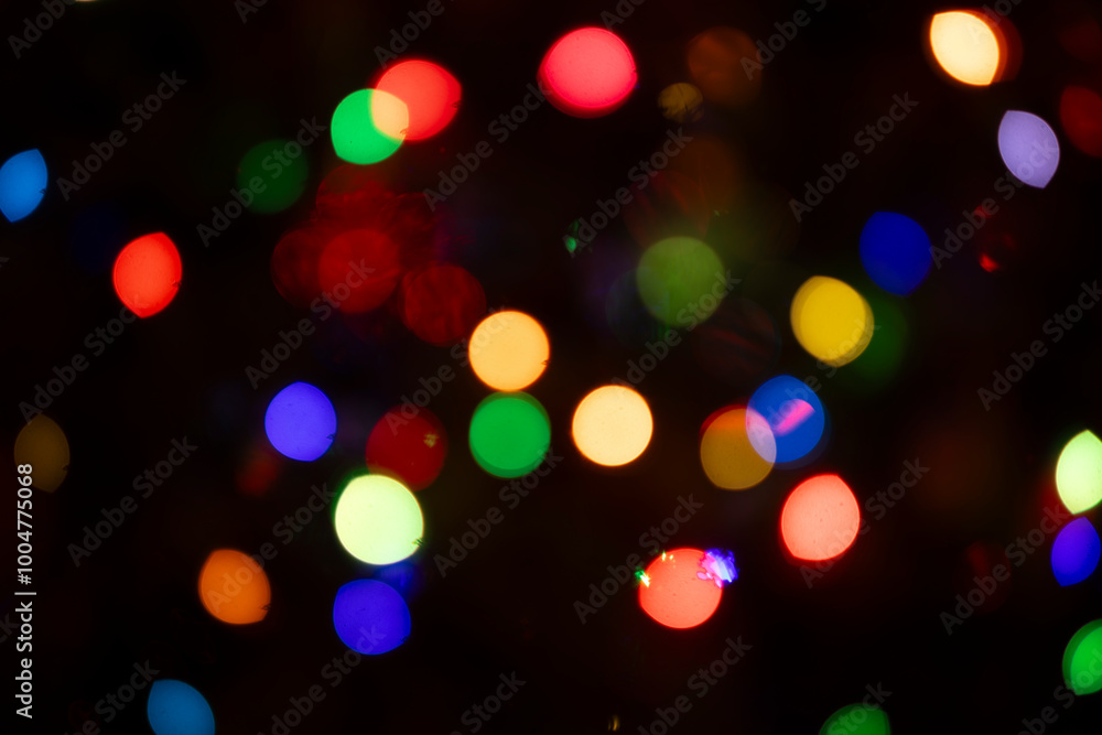 Colorful Swirling Lenticular Bokeh Balls of Christmas Tree Lights Decoration for Festive Holiday Season Colorful Swirling Lenticular Bokeh Balls of Christmas Tree Lights Decoration for Festive Holiday Season