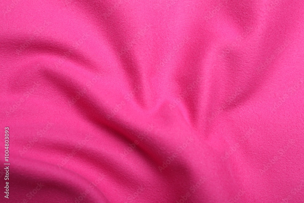 Fototapeta premium Crumpled pink microfiber cloth as background, closeup