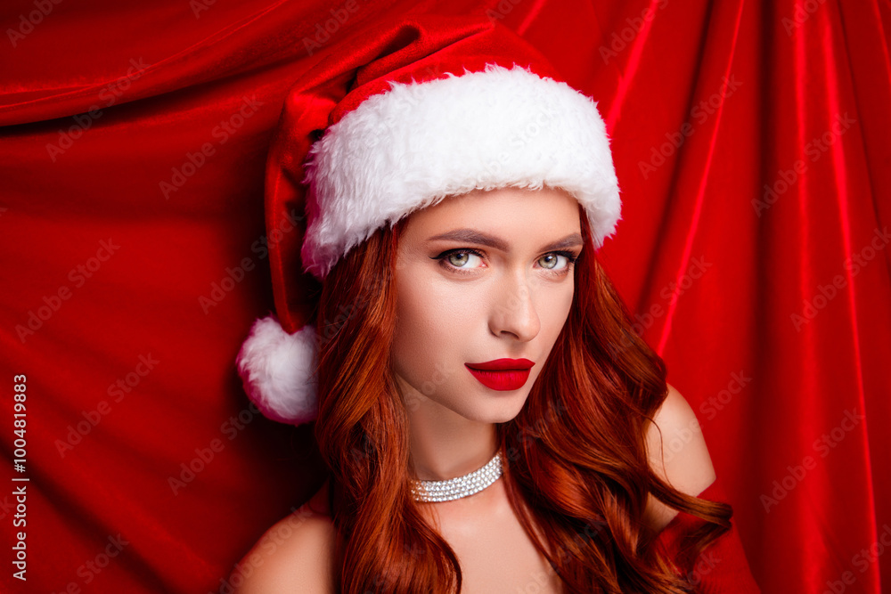 Photo of attractive lady santa in santa claus headwear look feel tempting teasing over red textile linen background Photo of attractive lady santa in santa claus headwear look feel tempting teasing over red textile linen background
