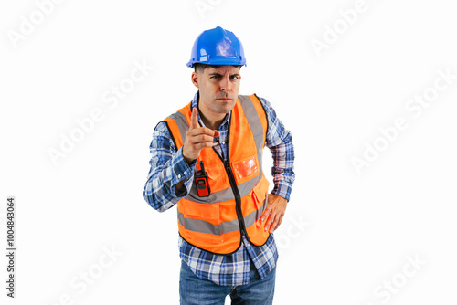 Angry construction worker in orange vest and hard hat scolding the camera with his hand