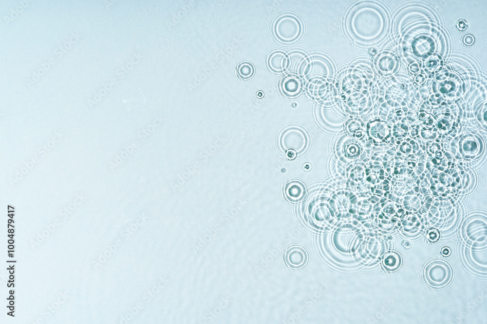 Gentle ripples form on a serene blue surface Gentle ripples form on a serene blue surface
