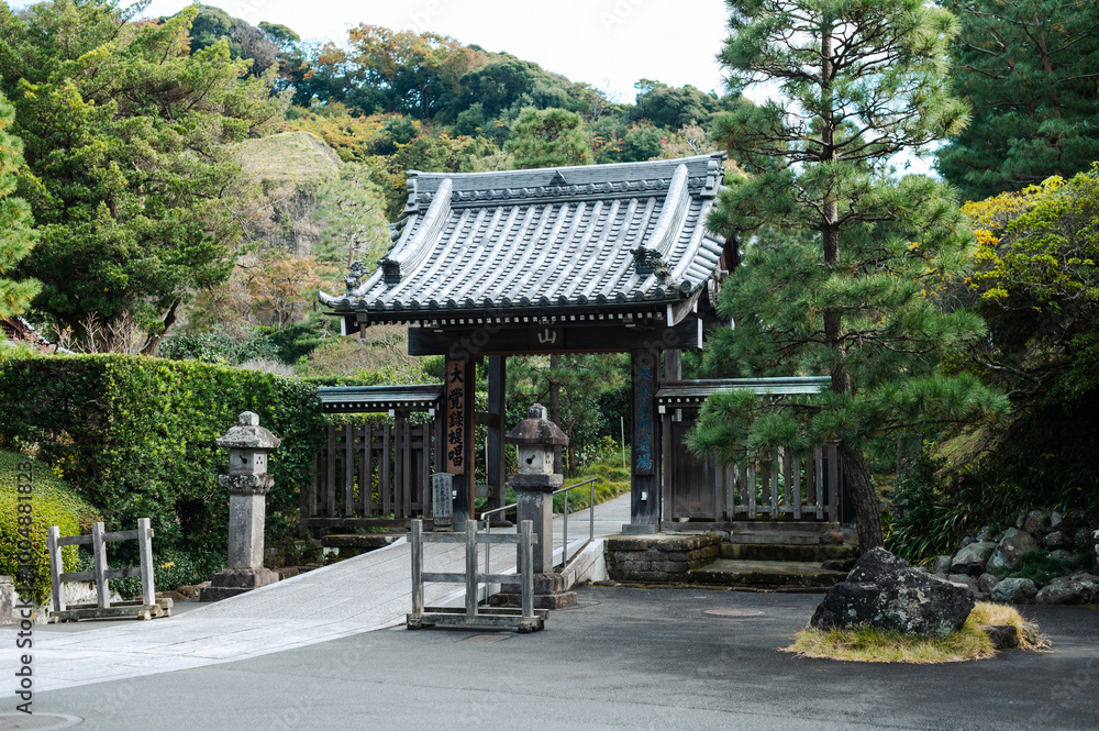 Traditional Japanese Gate in Peaceful Garden Setting Traditional Japanese Gate in Peaceful Garden Setting