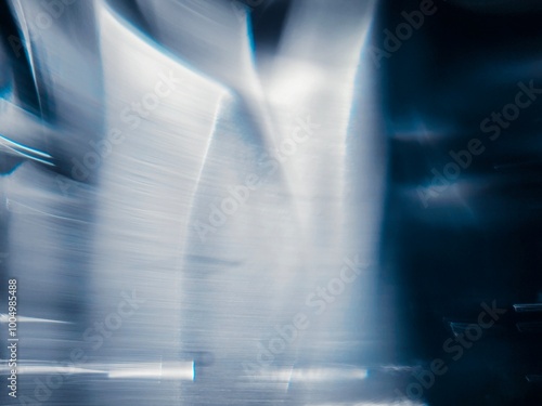 Blue bokeh light effect against a dark background The speed of light creates beautiful compositions.