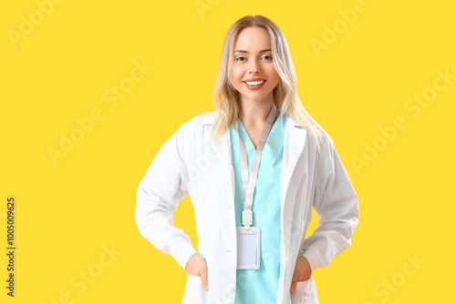 Female doctor on yellow bac...