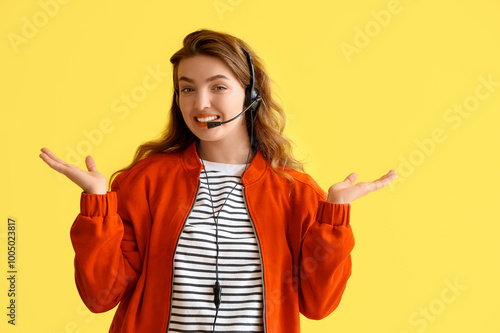 Female technical support agent on yellow background