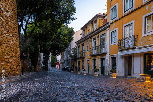 Twilight view of Alfama, one of Lisbon’s oldest areas with shops selling traditional crafts and cafes, Portugal