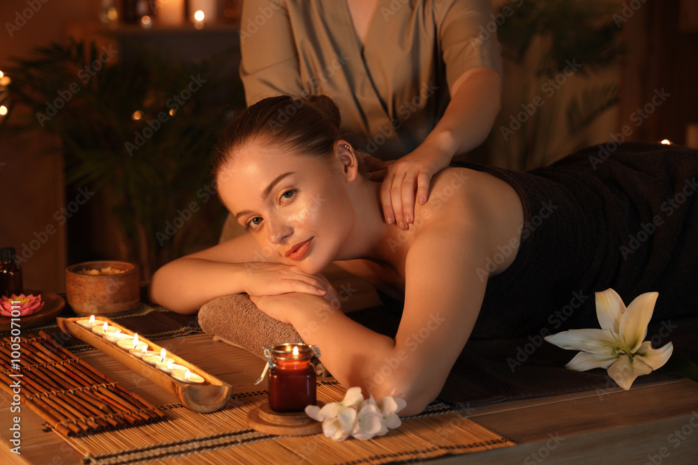 Φωτογραφία Beautiful young woman getting massage in dark spa salon, closeup