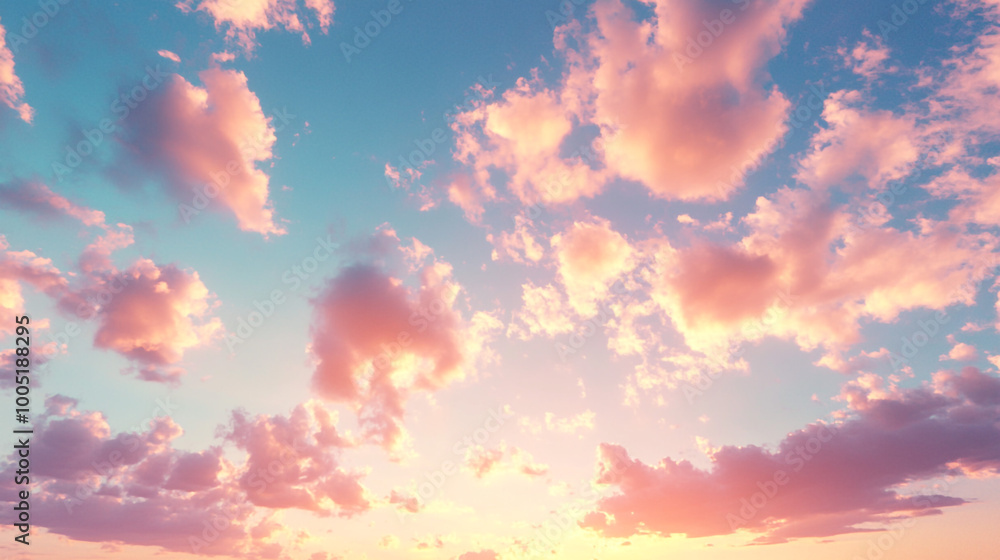 Serene Sky with Fluffy Pink and Orange Clouds at Sunset. A tranquil evening sky features fluffy pink and orange clouds against a calming blue backdrop, creating a serene atmosphere Serene Sky with Fluffy Pink and Orange Clouds at Sunset. A tranquil evening sky features fluffy pink and orange clouds against a calming blue backdrop, creating a serene atmosphere