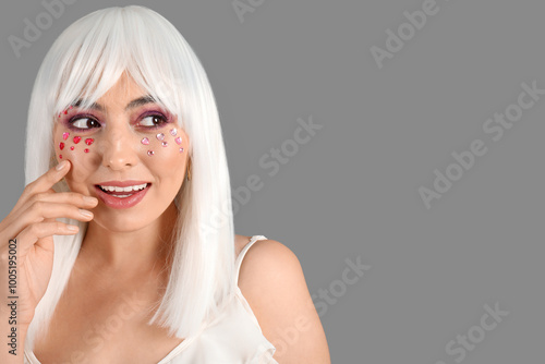Happy young woman in white ...