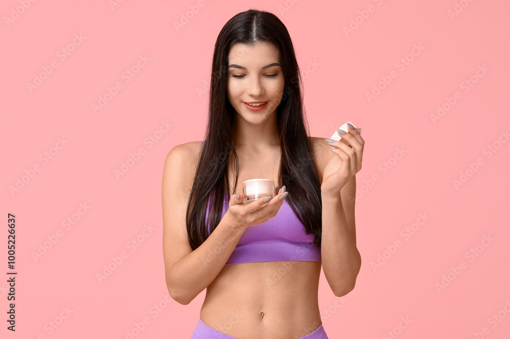 Beautiful young woman with jar of cream on pink background Beautiful young woman with jar of cream on pink background