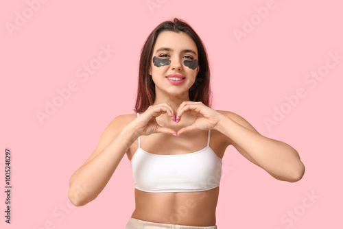 Smiling young woman with un...