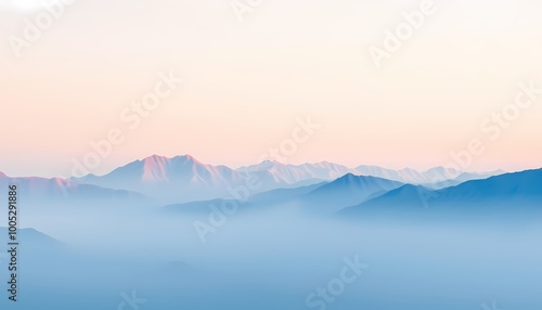 Delicate Pastel Watercolor Mountains Fading into Mist with Soft Blue and Cream Gradient Sky