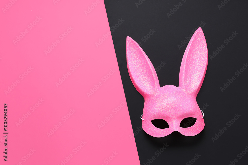 Pink bunny mask on color background Pink bunny mask on color background