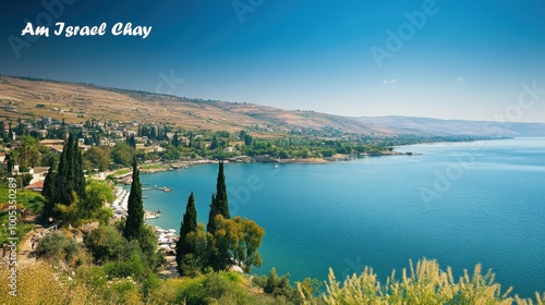 Beautiful view of the Sea of Galilee with distant hills under a clear blue sky, featuring 