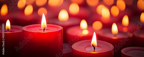 Background filled with red candles and their warm flames, creating a romantic and intimate ambiance with a cozy candlelit glow