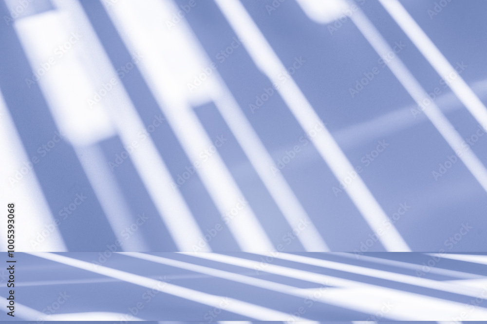Studio style background wall decoration presentation uses white and blue tones. with shadows cast from a nearby window, concept creating a decorative backdrop. Studio style background wall decoration presentation uses white and blue tones. with shadows cast from a nearby window, concept creating a decorative backdrop.