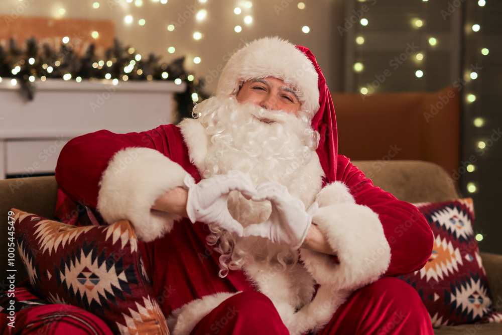 Santa Claus making heart gesture at home on Christmas eve Santa Claus making heart gesture at home on Christmas eve