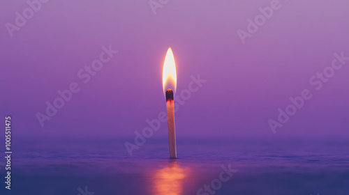 A single matchstick burning brightly against a purple background.