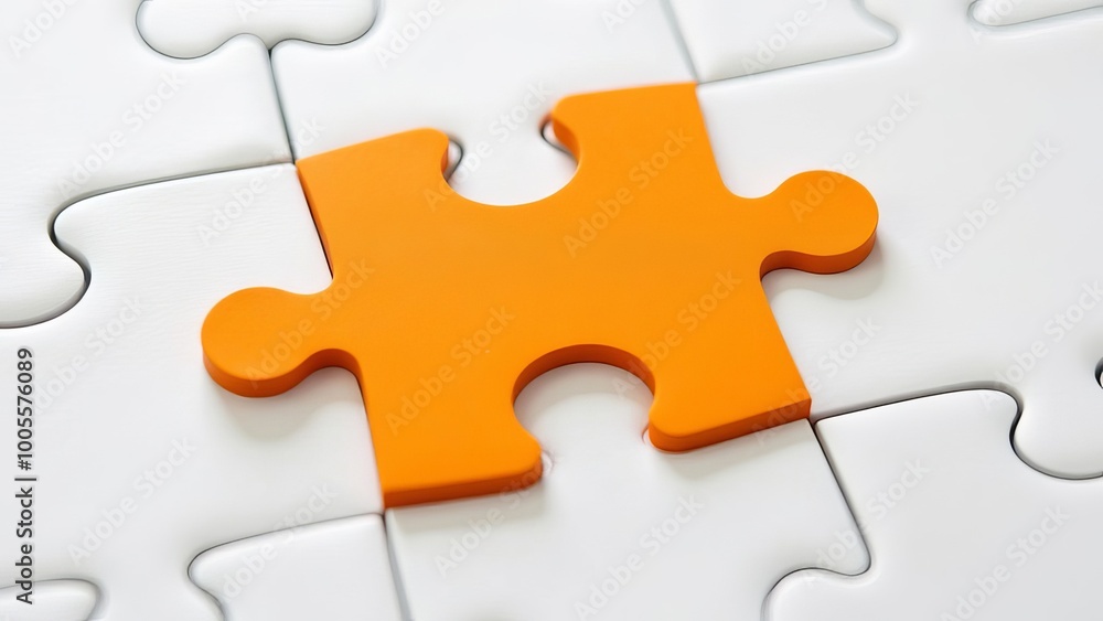 Picture of an orange puzzle piece that fits into a white puzzle. Teamwork, solutions, and problem-solving concepts are emphasized Picture of an orange puzzle piece that fits into a white puzzle. Teamwork, solutions, and problem-solving concepts are emphasized