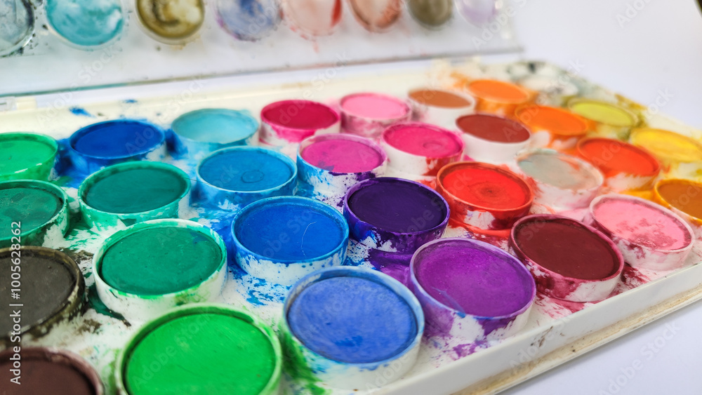 Set with strokes of colorful oil paints on white background, top view Set with strokes of colorful oil paints on white background, top view