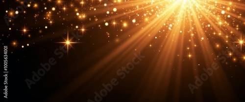 Radiant golden light beams with sparkling stars on a dark background with copy space