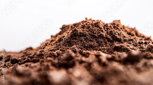 Close Up Of Moist Brown Fresh Soil on a White Background .generative ai