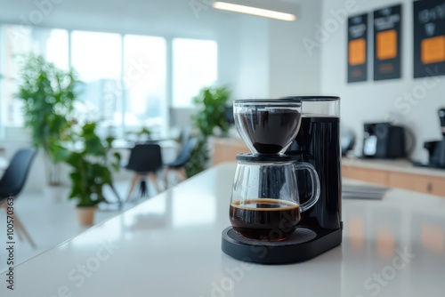 A sleek coffee maker brews fresh coffee, set in a modern kitchen filled with plants and natural light. photo