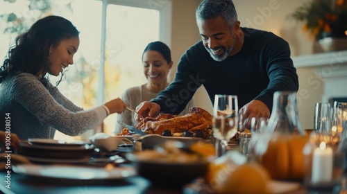 Front view of a family setting the table together, preparing for their Thanksgiving feast.