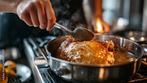 A Hand Basting a Roasted Turkey Leg in a Pan with Gravy