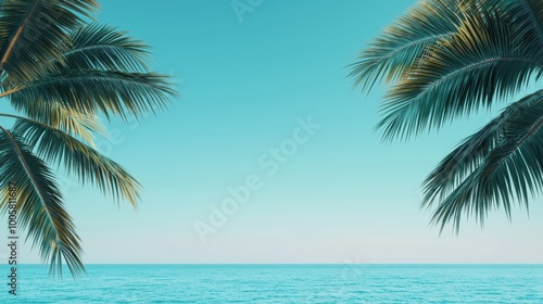 Tropical beach view with palm trees, clear blue ocean and sky. photo