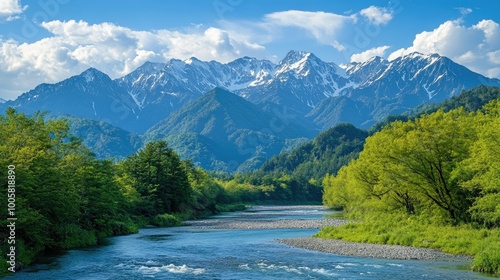 Majestic Hotaka Mountains overlooking the peaceful Azusa River in Kamikachi, surrounded by fresh greenery, capturing the untouched beauty of Nagano's natural landscape.