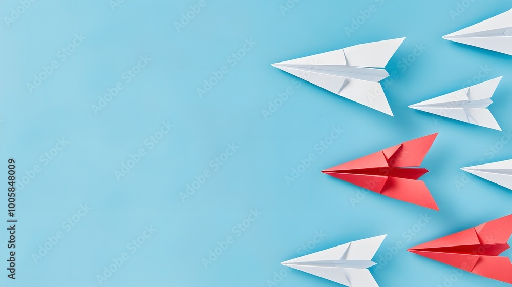 Red and White Planes Against a Blue Background Symbolizing Business Innovation and Creative Solutions Concept Red and White Planes Against a Blue Background Symbolizing Business Innovation and Creative Solutions Concept