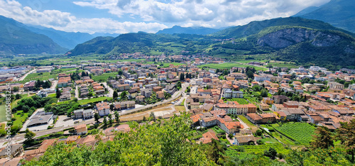 Tableau sur toile Panoramic view of the village of Mori, Italy and the surrounding vineyards and m