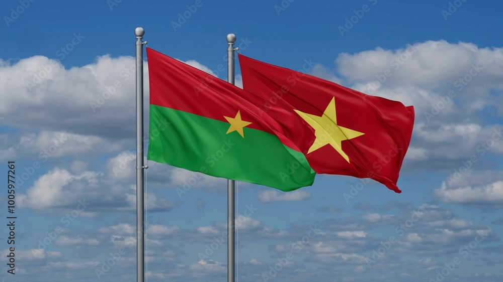 Vietnam and Burkina Faso flags flying together, video concept of the relationship Vietnam and Burkina Faso flags flying together, video concept of the relationship