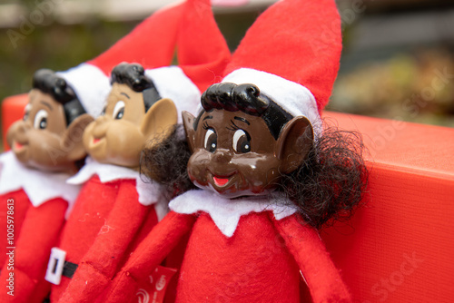 A biracial naughty Elf doll or Elves Behaving Badly Boy and Girl ELF- Naughty Elves