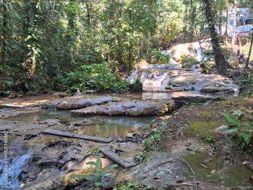 Saluopa Waterfall: Located in the Heart of the Forest of Central Sulawesi, Featuring 12 Stunning and Crystal Clear Waterfalls. The waterfall is a favorite and is always sought after by foreign tourist photo