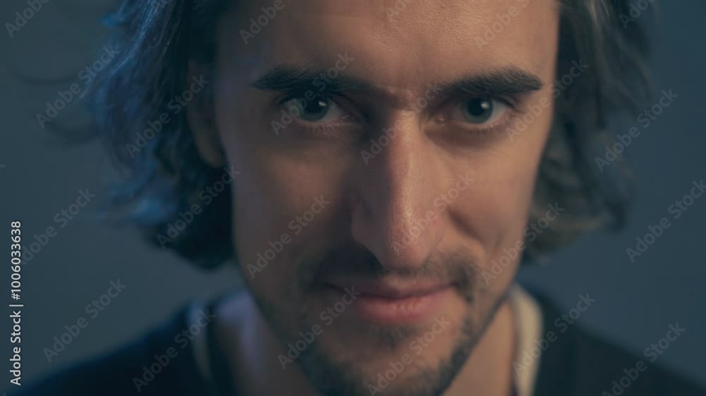 a young man with long hair, large expressive eyes, European appearance, looks intently, smiles slightly, winks with his left eye a young man with long hair, large expressive eyes, European appearance, looks intently, smiles slightly, winks with his left eye