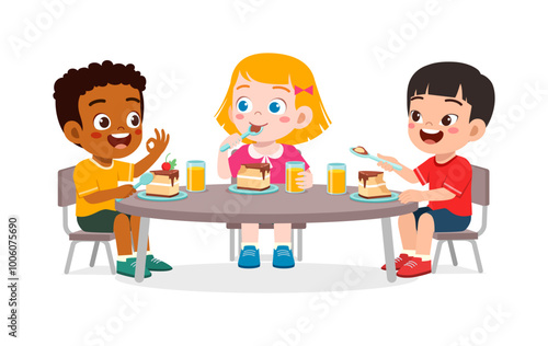 happy cute little kid boy and girl eat a birthday cake