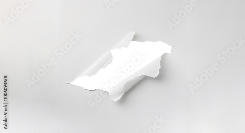 torn piece of white paper reveals dark background, creating striking contrast. This graphic element is perfect for designers looking to add depth and intrigue to their projects