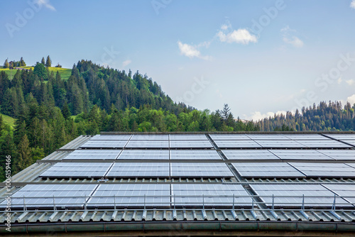 Solar panels on the roof of a house overlooking Lake Walen in Betlis, Switzerland photo