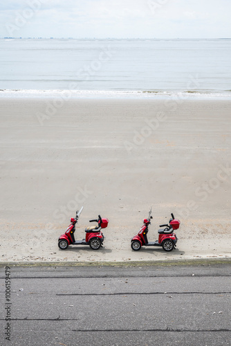 Electromobiles parked at the beach in Borkum, Lower Saxony. photo