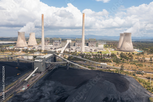 Aerial view of piles of coal and the Bayswater coal-fired power station near Muswellbrook in the Hunter Valley, NSW, Australia
