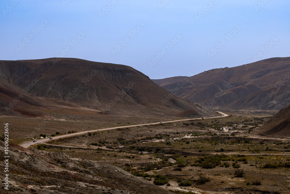 Khizi, Azerbaijan A road and scenery with colorful shale rock at the famous Candycane Mountains. Khizi, Azerbaijan A road and scenery with colorful shale rock at the famous Candycane Mountains.
