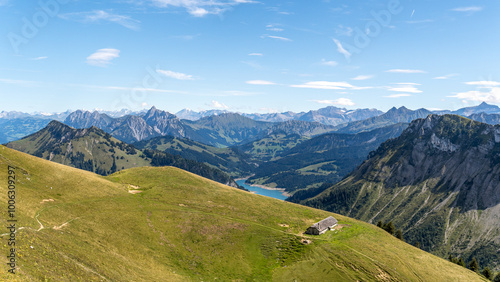 Wallpaper Mural Isolated Hut Below Rocky Mountain Peaks in the Swiss Alps Torontodigital.ca