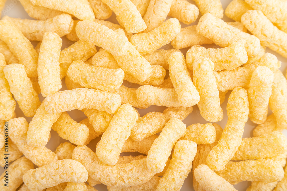 Corn flakes sticks with caramel isolated on white, top view, close up. Corn flakes sticks with caramel isolated on white, top view, close up.