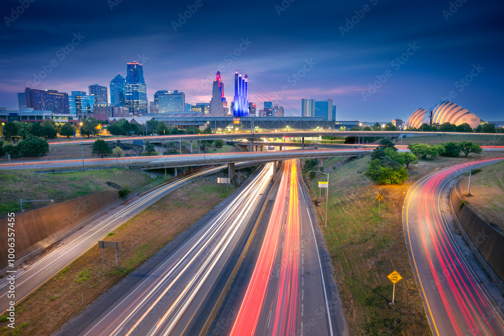 Kansas City, Missouri, USA. Cityscape image of Kansas City skyline with busy highway leading to the city at autumn sunrise.