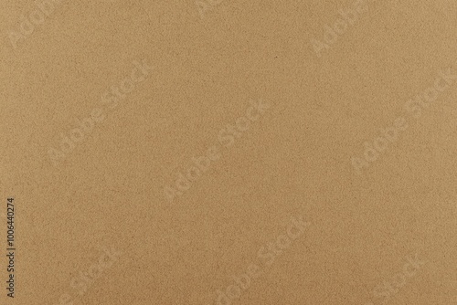 A close-up shot of a plain brown paper texture.