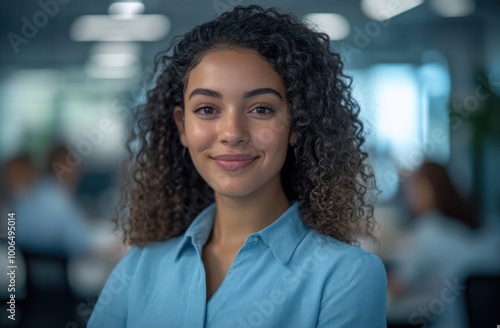 Professional Portrait of a Young Woman in an Office Setting Radiating Confidence and Positivity